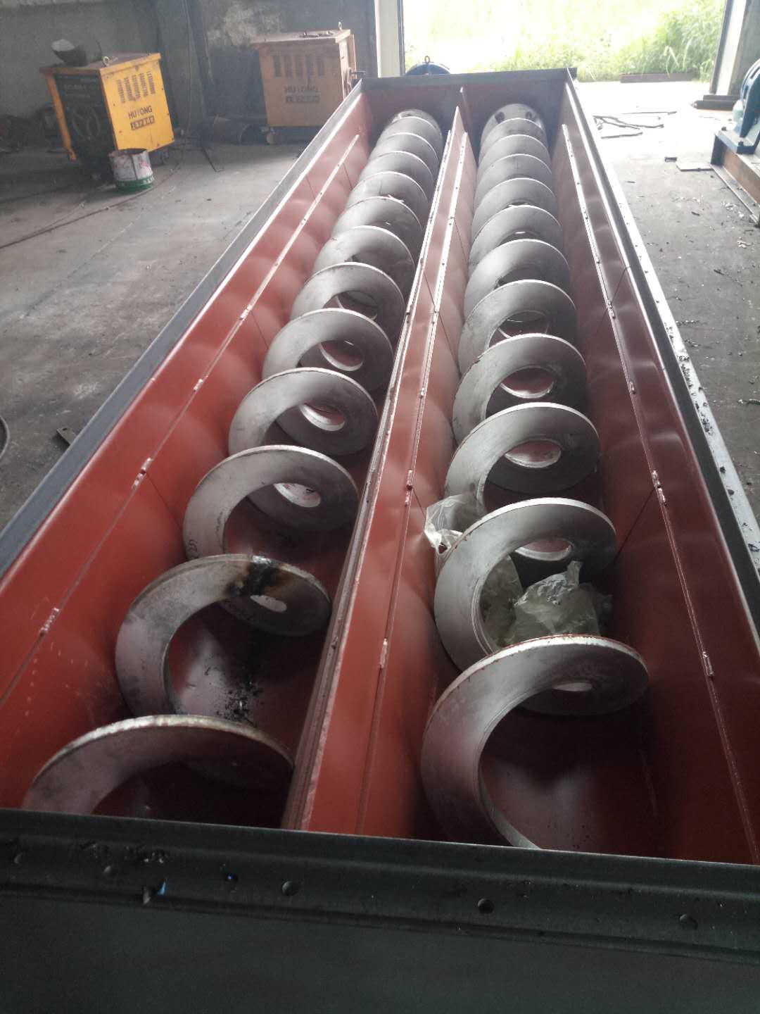 泽宇环保双轴螺旋输送机的生产优势有哪些